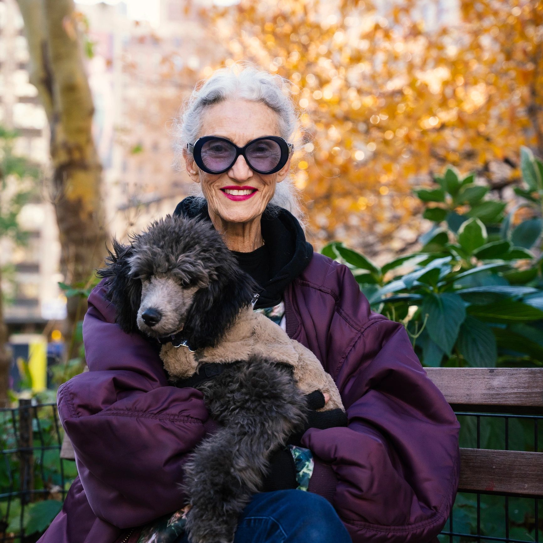 Portrait of a smiling dog owner with dog